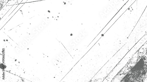 Abstract textured background with grey scratches and speckles on white surface