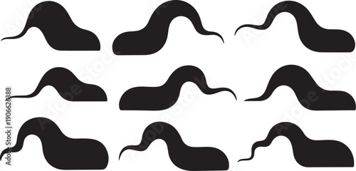 Collection of various black worm silhouettes on white background