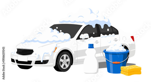 White Sedan Car Covered in Thick Soap Suds with Blue Bucket Soap Bottle and Sponges.