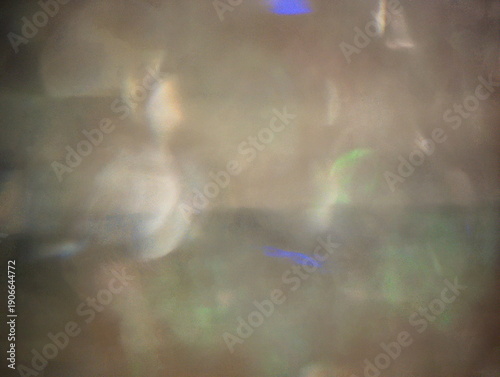 Foto Ripresa astratta con luci diffuse multicolore fuori fuoco, caratterizzata da rif