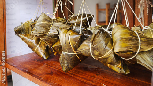 Bilde på lerret Zongzi, an ancient Chinese traditional dish wrapped in fragrant leaves, crafted with fine ingredients and cherished in cultural festival rituals