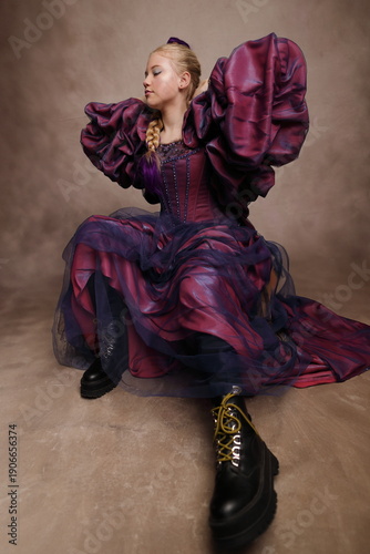 Artistic Fashion Portrait of Girl in Purple Gown