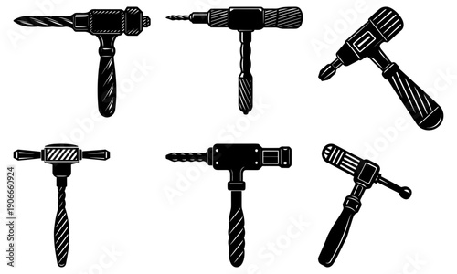 Collection of drill bits and power tools on a white background viewed from directly above