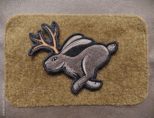 High speed Jackalope morale patch is a velcro patch for attaching to clothing and bags.