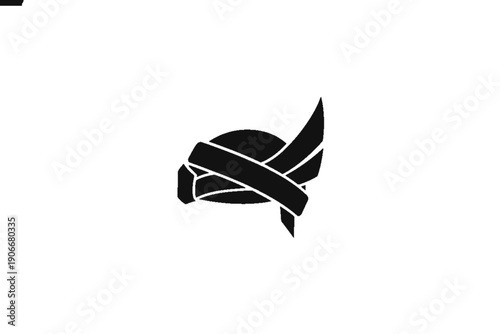 Symbol of Reverence: A stylized monochrome representation of a Sikh turban, conveying respect and tradition.