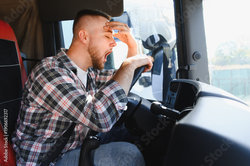 Photos Truck driver yawning feeling fatigue behind wheel