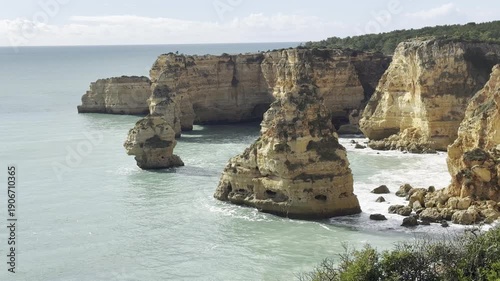 Landscape with beautiful Praia da Marinha, one of the most famous beaches of Portugal, located on the Atlantic coast in Lagoa, Algarve.