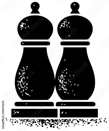 Black filled icon of salt and pepper shaker set with white specks on white background