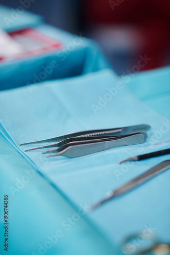 Surgical forceps on operating room table