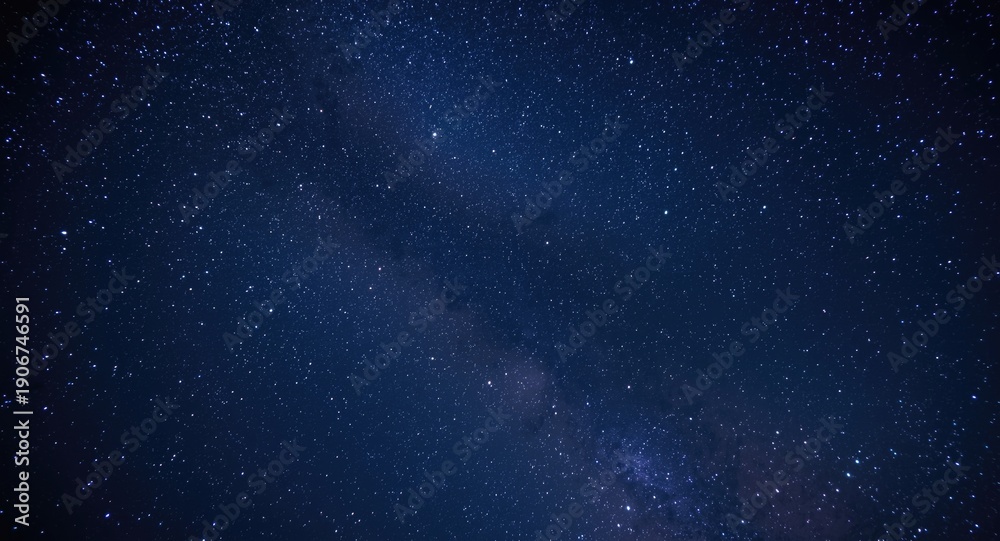 Fototapeta premium An impressive star filled night sky showcasing a cosmic spectacle far from urban lights