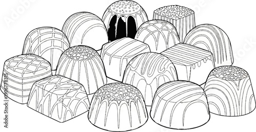 A variety of intricately designed chocolates displayed in a pleasing arrangement