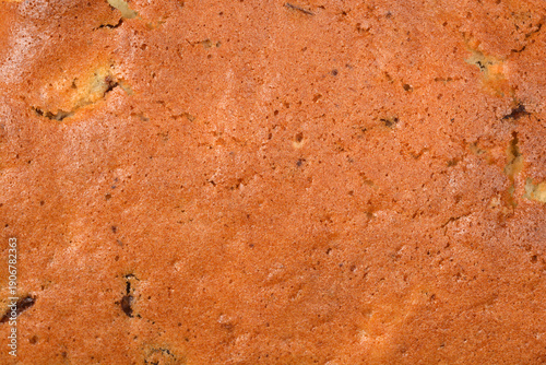 Bild auf Leinwand A high resolution macro shot of a golden brown baked sponge cake surface showing
