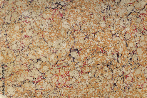 Marbled paper pattern creating abstract texture background