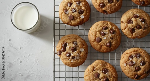 Wallpaper Mural High angle image of chocolate chip cookies sprinkled with salt flakes on wire rack with chilled milk Torontodigital.ca
