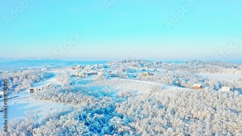 Winter Aerial View of Snowy Rural Village