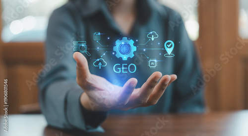 Bild auf Leinwand Person hand holding virtual GEO Generative Engine Optimization text with AI brai