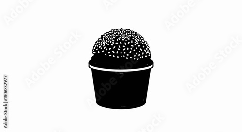 Black and white illustration of a single round cake in a cup with white sprinkles