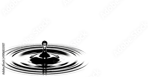 A single water drop creates concentric ripples on a plain surface