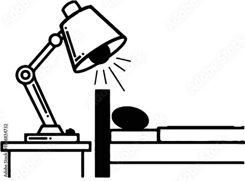 A study lamp illuminates an oval object on a simple bed