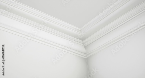 close up shot of white ceiling molding in a minimalist room interior