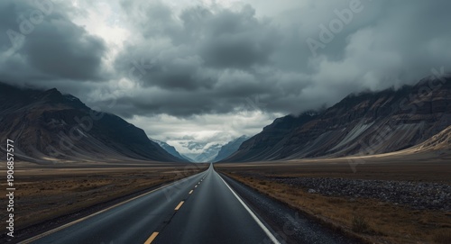A highway bordered by mount...