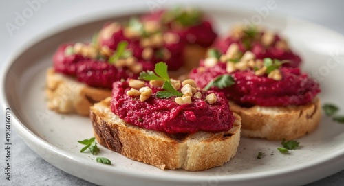 Wallpaper Mural Colorful beetroot hummus on grilled bruschetta garnished with nuts and tiny leafy greens Torontodigital.ca
