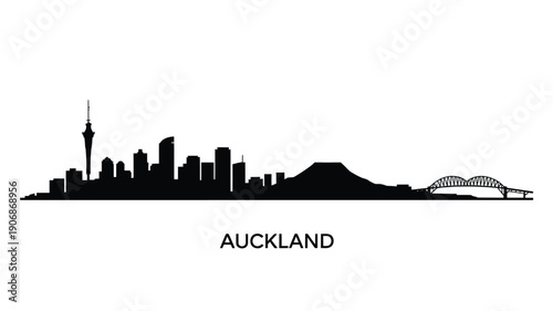 Auckland skyline silhouette featuring the Sky Tower and Harbour Bridge new zealand