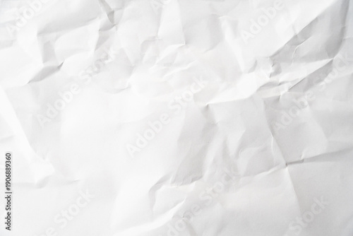 Grunge wrinkled white color paper textured background with copy space. Use for decoration or layer