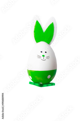 Decorative Easter egg bunny with felt ears, green polka dots and smiling face, festive spring ornament