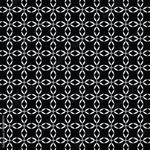 abstract black and white geometric seamless pattern featuring repeating shapes