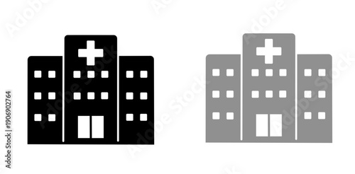 Simple flat hospital building icon set with medical cross symbol and windows. Vector illustration of hospital building icon set 