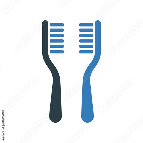 Two toothbrushes side by side for oral hygiene and dental health care