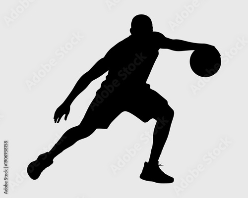A black silhouette of a man playing basketball