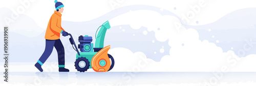 Person clearing snow with a snow blower in a winter landscape