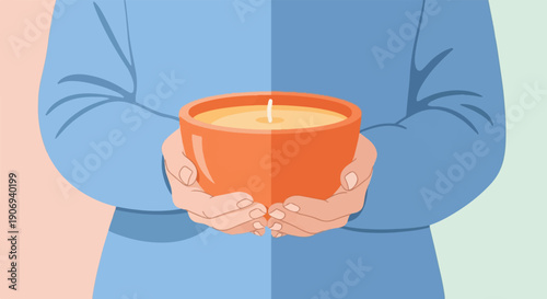 Person holding a lit candle in a bowl