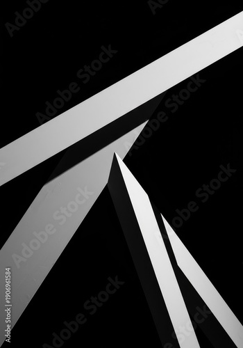 Dynamic high-contrast black and white abstract study featuring sharp diagonal lines and heavy geometric shadow play creating a strong modern visual ,diagonal ,background ,design