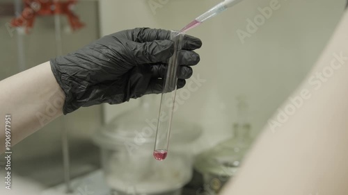 Pipette with red liquid in laboratory 4k 
