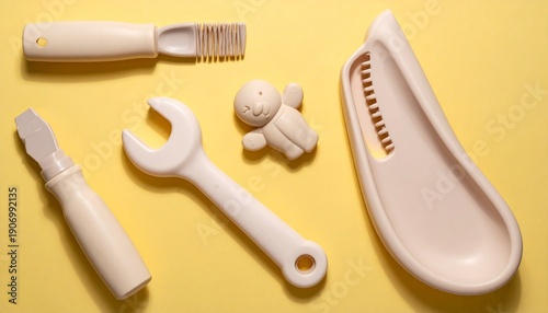 Wallpaper Mural Beige Plastic Toys on Yellow Background – Children’s Playset Concept Torontodigital.ca