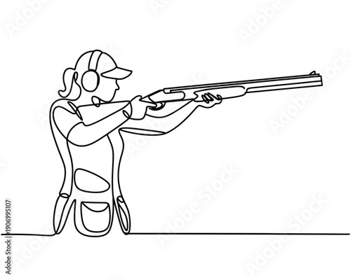 A person aims a shotgun while participating in a sport.