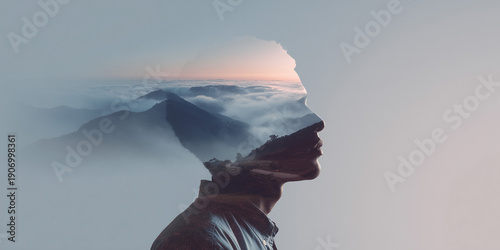 A person's head silhouette with stunning mountain ranges merging within its contours, creating a surreal and artistic blend. This image embodies a sense of deep thought and contemplation