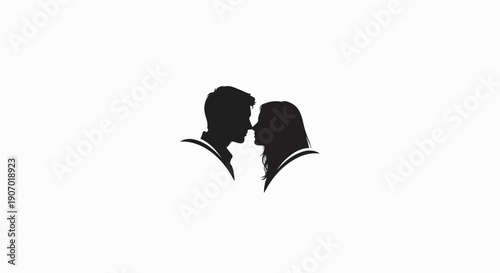 Silhouette of couple's profile faces about to kiss against white background