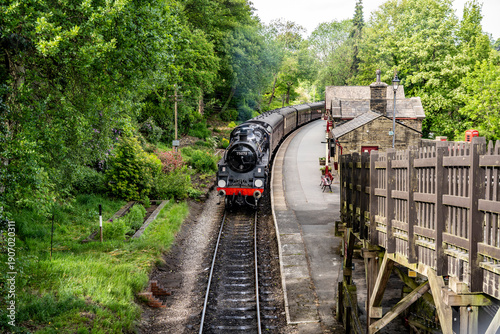 The historic steam locomotive of the Keighley and Worth Valley Railway at Haworth Station, evocative experience in the Brontë Country, Yorkshire, England, United Kingdom.