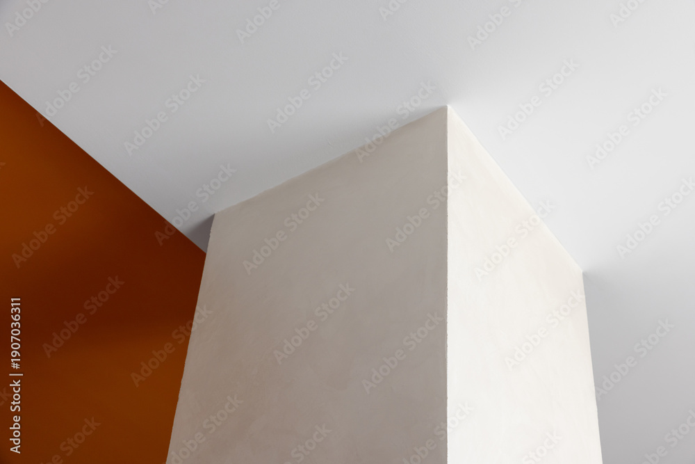 Obraz premium A stark white pillar rises at a sharp angle