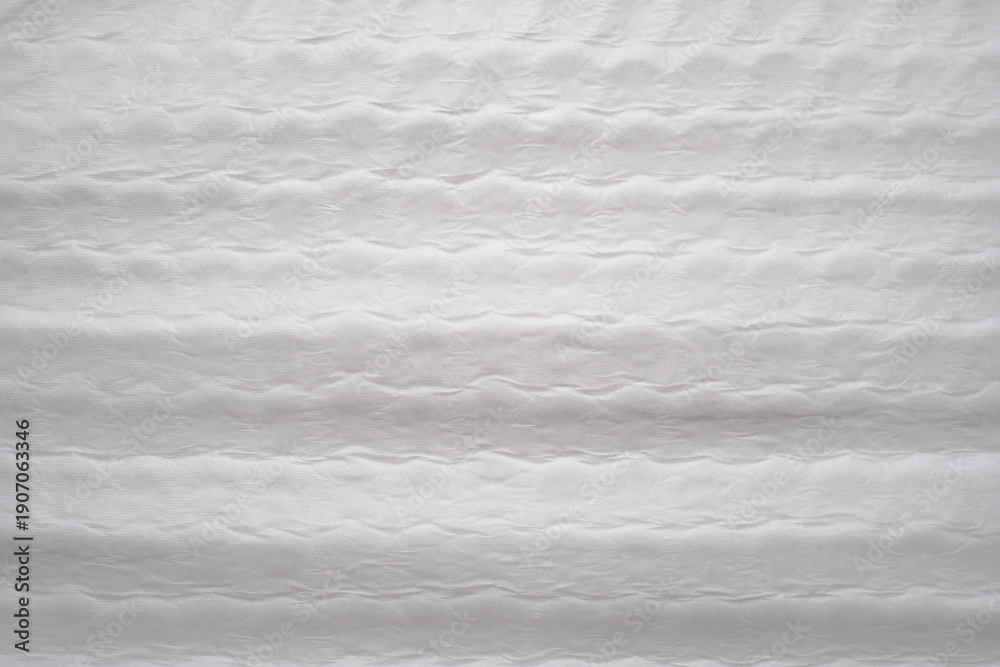 Fototapeta premium Side View of White Fabric Mattress Texture With Quilted Pattern