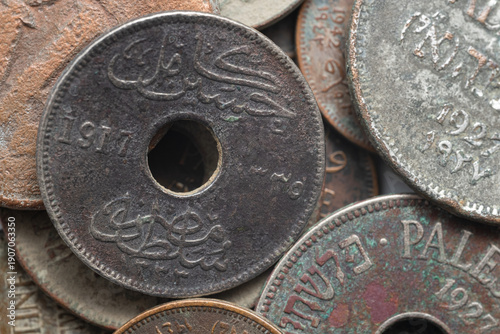 Naklejka Ancient Holed Coin Dated 1917 with Arabic Script