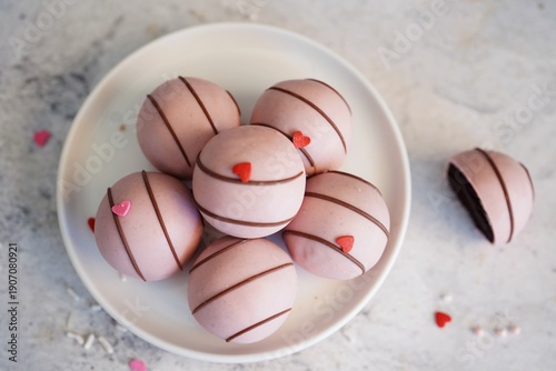 Chocolate Cake balls covered in pink icing | Valentines day sweets, selective focus