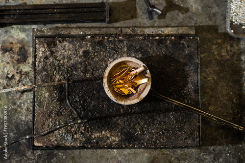 Obraz na plátně Crucible filled with gold and metal alloys, ready for melting.