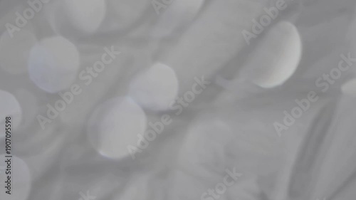 Soft White Bokeh Background with Blurred Circles and Gentle Light Play for Design and Artistic Use