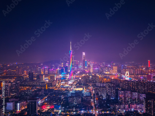 Wallpaper Mural Aerial top night view of Guangzhou cityscape with vibrant neon lights and skyscrapers of China Torontodigital.ca