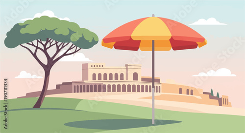 Sunny day with ancient ruins, green grass, and a beach umbrella